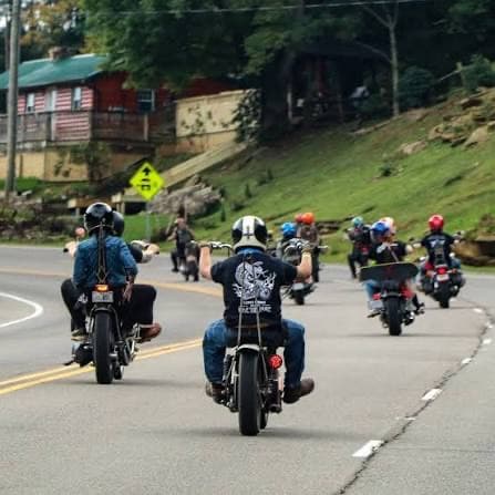 Riders cruising a two-lane country road