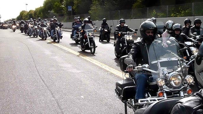 A large pack of cruisers rolling down the highway together