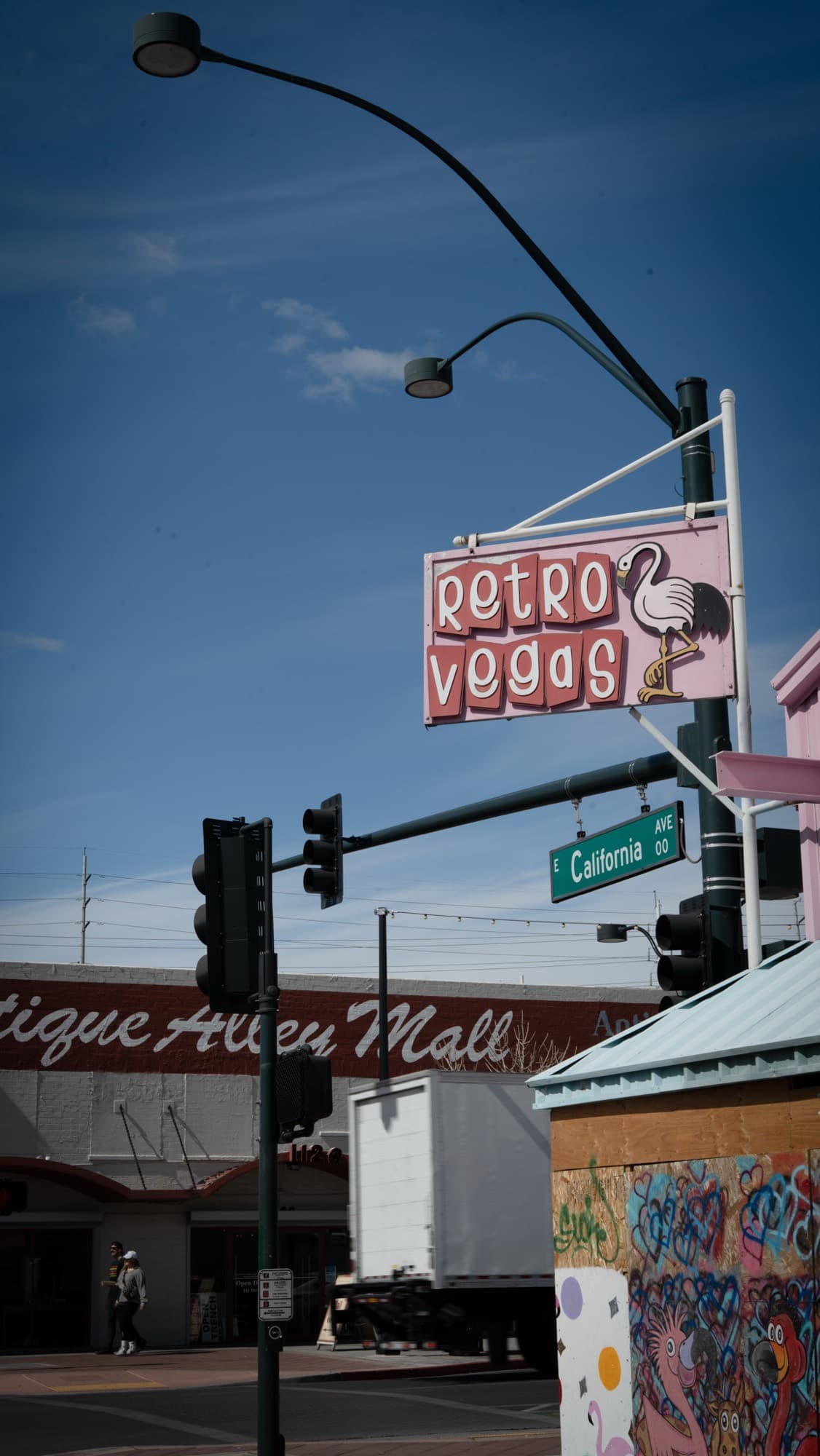 A retro 'Retro Vegas' sign over a downtown antique mall